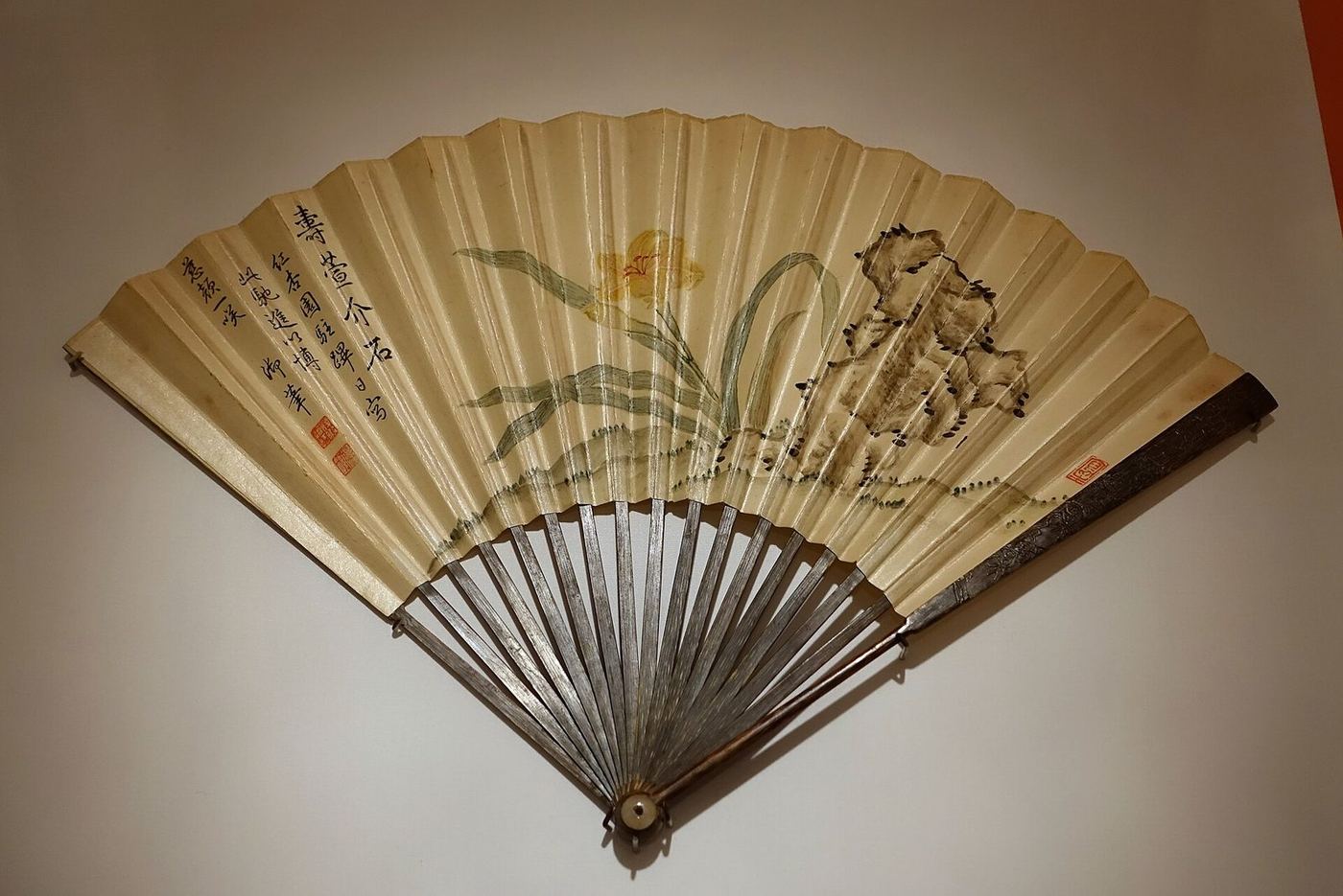 Chinese folding fan painted by the Qianlong emperor in 1762 with daylilies, rocks and a poem, Peabody Essex Museum