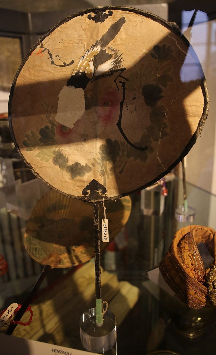 Chinese round fans of painted paper and bamboo from around 1890 to 1910