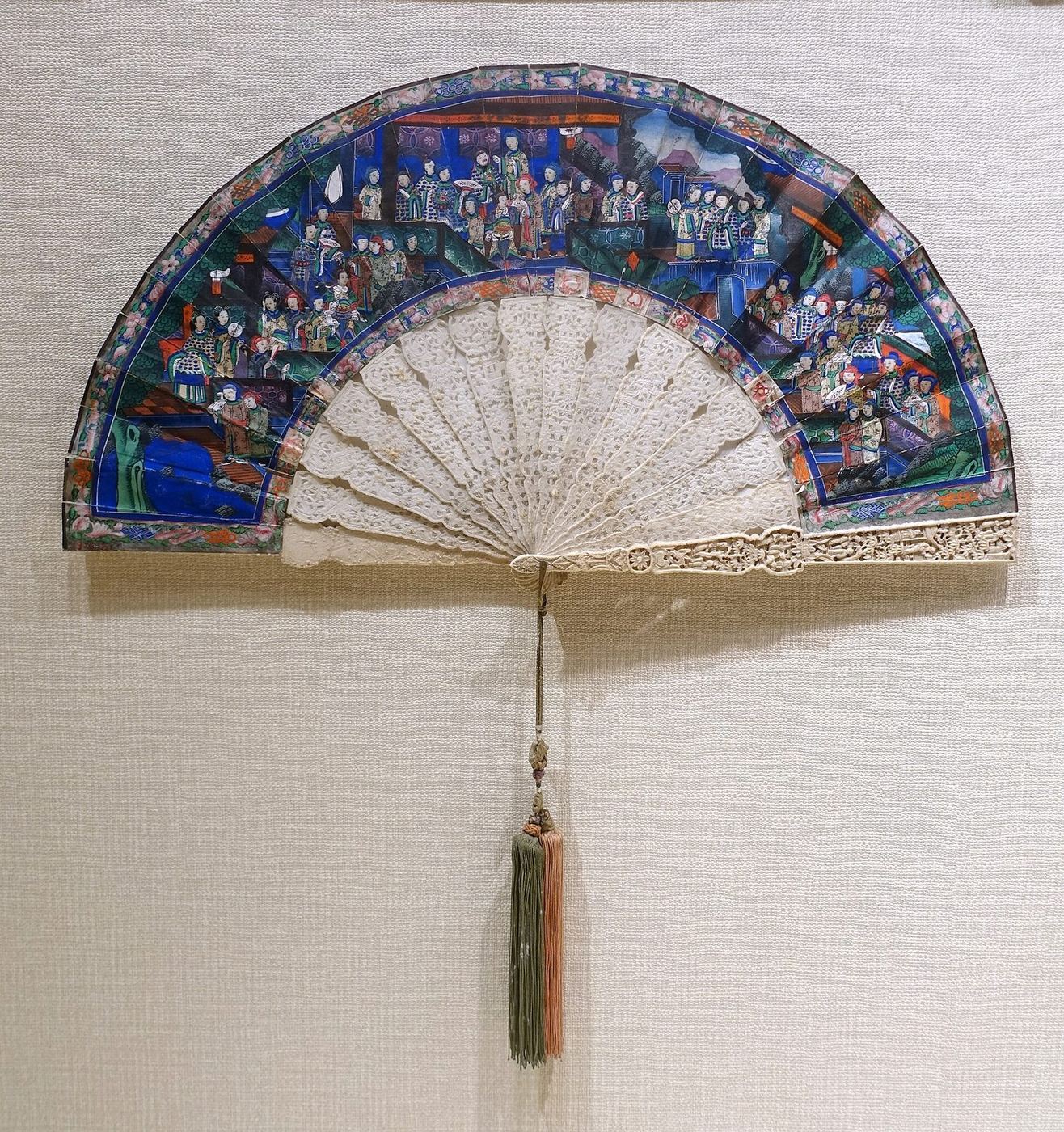 Traditional Chinese fans displayed in the Sichuan University Museum, showing folding and round forms